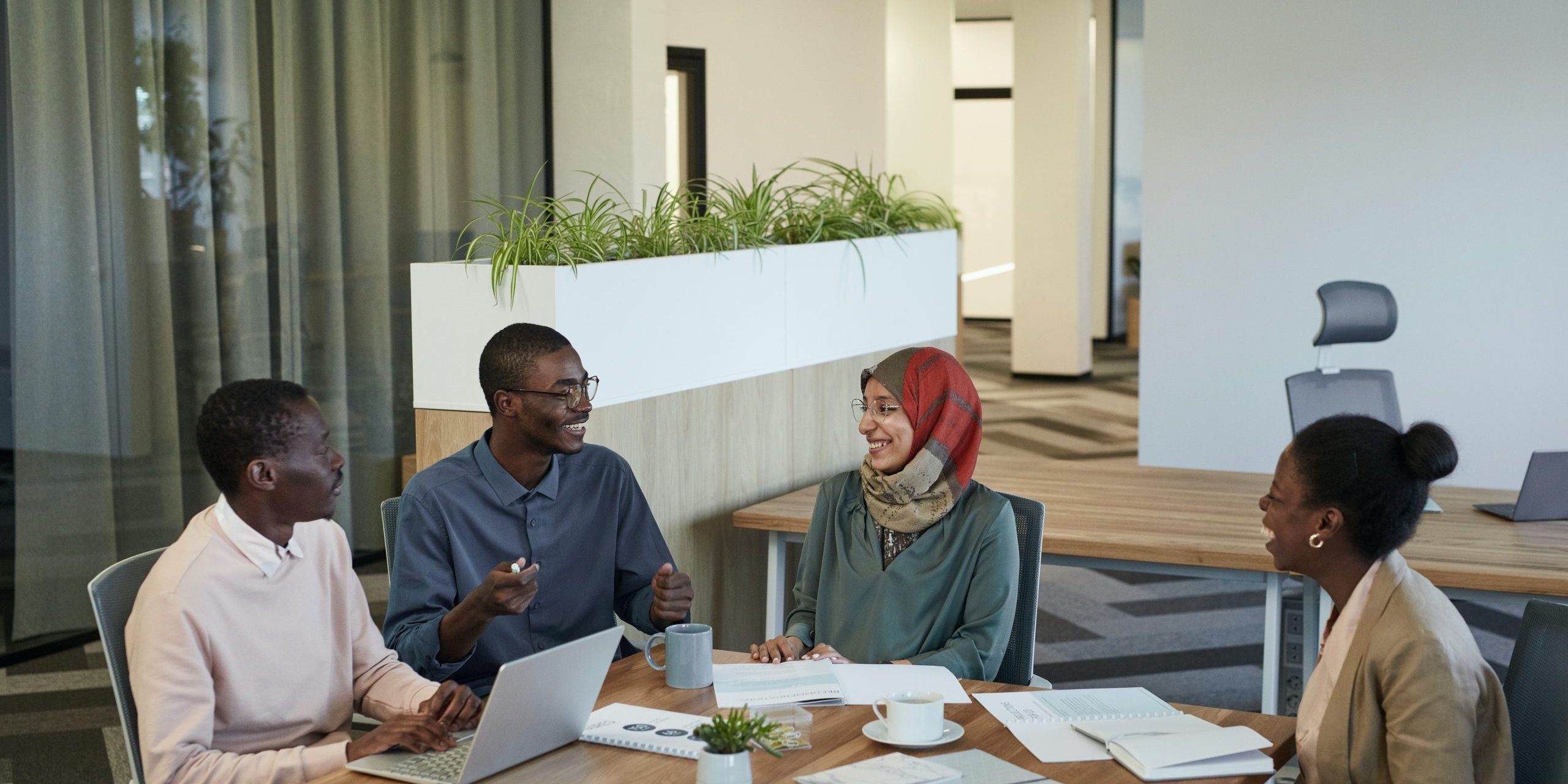 Group of realtors having a friendly discussion 